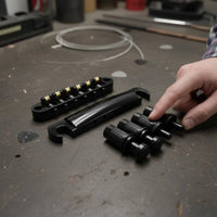 Tune-O-Adjustable Roller Bridge Reduces String Breakage Musical Instrument