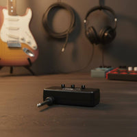 Mini Plug-in Guitar Amplifier Palm-Sized Mini Practice Amp Lightweight