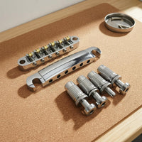 Tune-O-Adjustable Roller Bridge Reduces String Breakage Musical Instrument