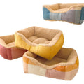 Lambswool semi-enclosed dog sofa with warm, removable cover.