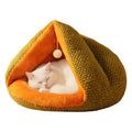 Plush cat bed with washable pad